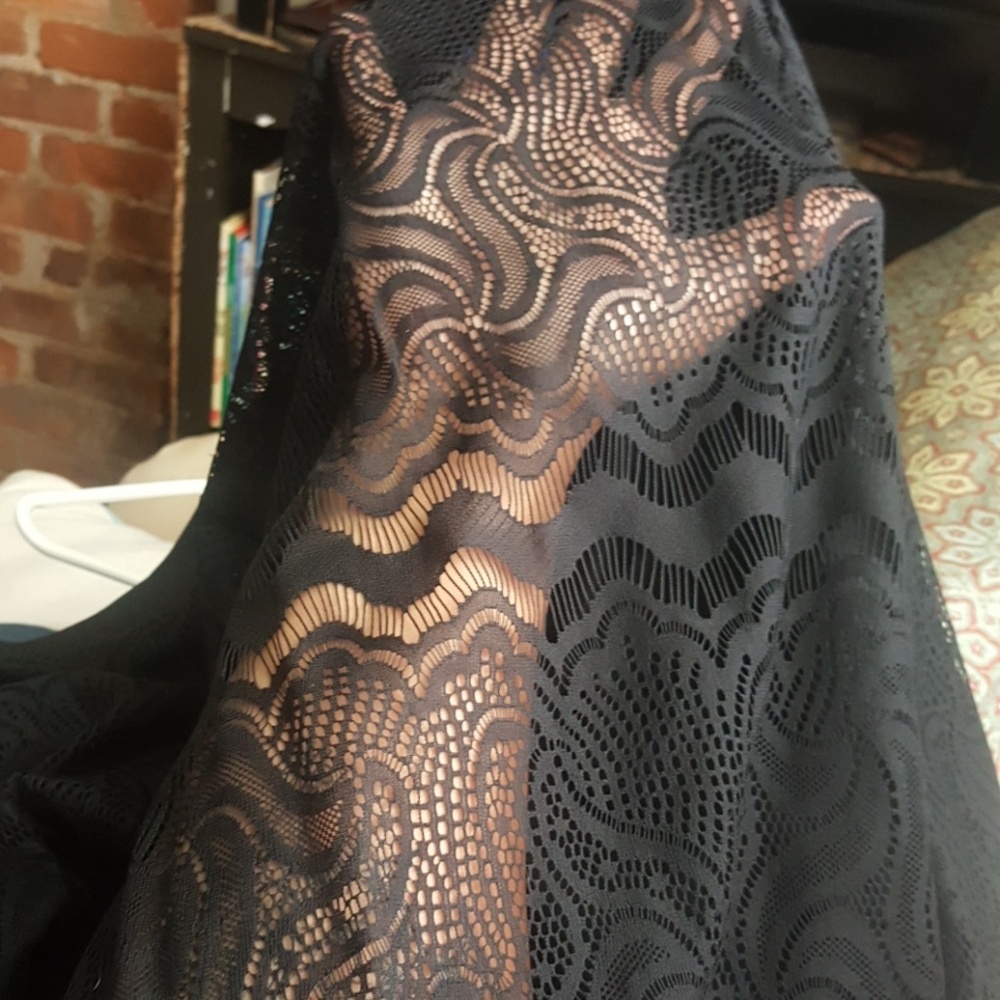 Pretty lace overlay pleated skirt.